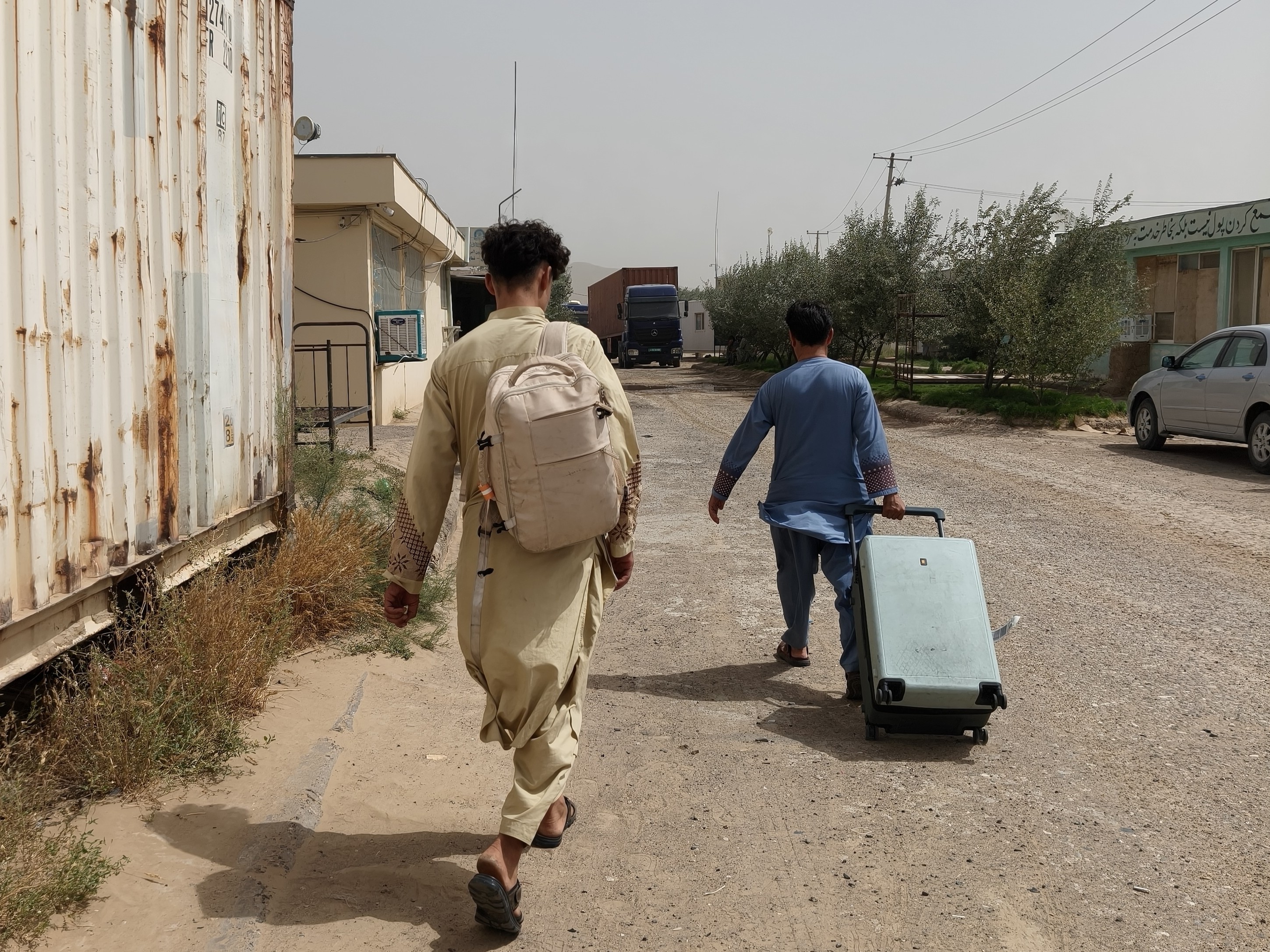 Crossing the Afghanistan Turkmenistan border at Serhetabat, the Afghan side