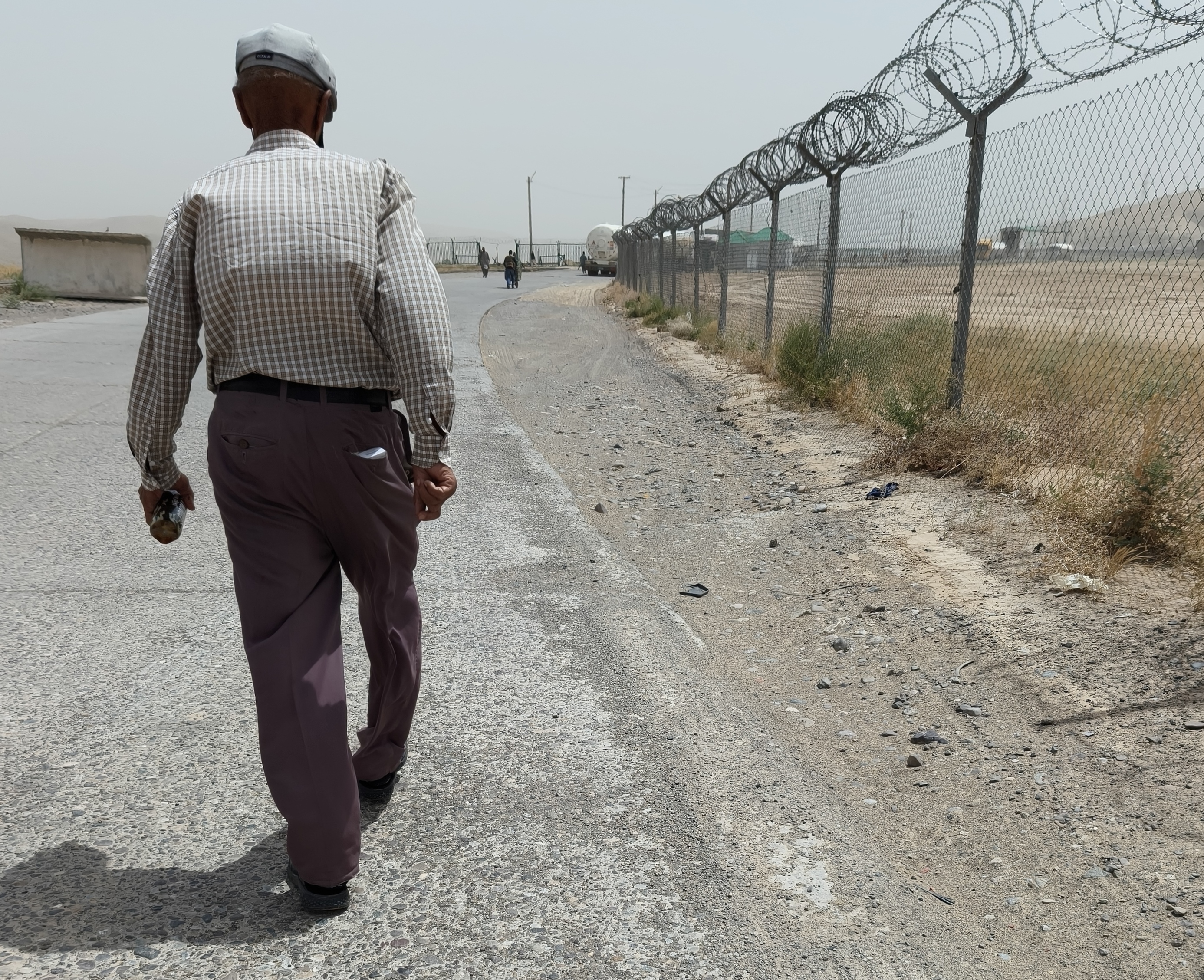 Walking across no mans land, Serhetabat border crossing between Turkmenistan and Afghanistan